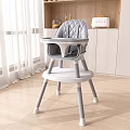 Gray Quilted Diamond Pattern High Chair With Tray In Modern Kitchen White Curtains Wooden Floor