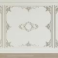 Elegant White Wall Decor With Ornate Classical Carvings And Symmetrical Patterns Design