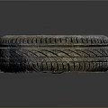 Worn Car Tire With Pink Hub And Black Holes On Textured Tread Surface