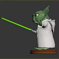Green Yoda Toy Figure With White Robe Orange Outfit And Green Lightsaber On Orange Base
