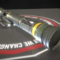 Military Rocket Launcher with Green Camouflage Design Yellow Stripe Accents Tactical Grip and Metal Body