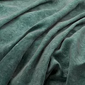 Elegant Green Velvet Fabric Showcasing Natural Wrinkles And Smooth Textured Surface