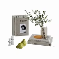 Stylish Decorative Ornament Arrangement with Books Vase Green Branches White Candles and Green Pears