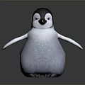 Cute Fluffy Baby Penguin In Black And White Standing On Gray Background