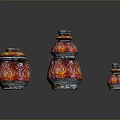 Carved Glass Vases in Red and Orange Patterns with Various Sizes on Black Background
