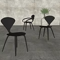 Modern Leisure Chairs With Unique Curved Back And Metal Legs In Concrete Interior