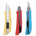 Three Different Colored Utility Knives With Yellow Red And Blue Handles