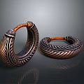 Vintage Style Copper Colored Hoop Earrings With Intricate Braided Surface Texture