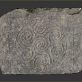 Decorative Wood Stone Slab Featuring Intricate Spiral Carved Patterns And Textured Surface