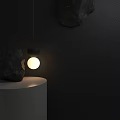 Decorative Hanging Light With Two Spherical Design White Cylindrical Base Black Stone And Dark Wall