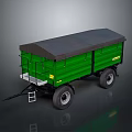 Green Agricultural Trailer With Grey Canopy Top And Yellow Side Signs