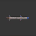 Rusty Military Missile Model with Blue Tip and Multiple Fins on Dark Background