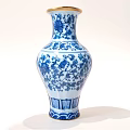 Traditional Ceramic Vase With Blue And White Floral Patterns And Gold Rimmed Mouth