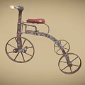 Vintage Tricycle with Rusted Metal Frame and Red Seat Three Wheels Design
