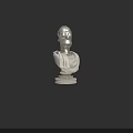 Silver Simpsons Character Bust Statue with Pedestal Base against Black Background