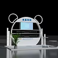 Food Beverage Exhibition Booth Featuring Circular Design Display Screen Shelves And Plants