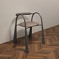Modern Dining Chair With Gray Frame And Brown Seat On Herringbone Wooden Floor