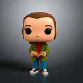 Cartoon Vinyl Figure With Brown Hair Big Eyes Green Jacket And Red Book