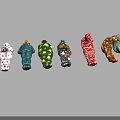 Assorted Stuffed Toys In Vibrant Colors And Unique Patterns