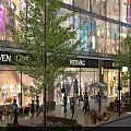 Bustling Commercial Street With Shop Windows Pedestrians Outdoor Seating Trees And Lighting