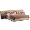 Tufted Beige Headboard Double Bed With Brown Blanket Orange Pillows And Nightstand