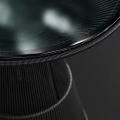 Sleek Modern Side Table With Round Glass Top And Black Metal Frame Design