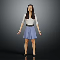Woman standing with open hands in white top and light blue skirt against dark background