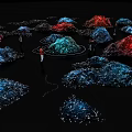 Colorful Illuminated Structures With Light Dots And People Interacting On Black Background