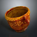 Hand Carved Ceramic Pottery With Orange Yellow Glaze And Intricate Pattern Design