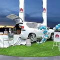 HUAWEI Photo Check In Spot With White SUV Open Trunk Balloons Table Chairs And Flags