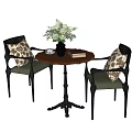 Round Table With Two Cushioned Chairs Vase Flowers Book And Cup 3d model