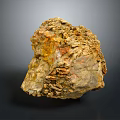 Hand Carved Stone Sculpture With Intricate Artistic Texture And Warm Color Hues