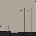 Three Black And Gold Floor Lamps Against Gray Wall With Arched Doorway And Floor
