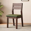 Walnut Wooden Dining Chair With Slatted Back Green Leather Seat And Potted Plant