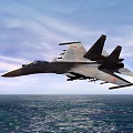 Military Fighter Jet Flying Over the Ocean Under Blue Sky with Clouds