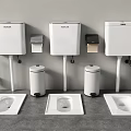 Contemporary Squat Toilet Setup With Water Tanks Trash Bins And Toilet Paper Holders