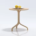 Round Wooden Coffee Table in Simple Modern Design With Plate Holding Fresh Lemons