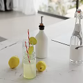 Decorative Ornament Set With Lemons Lemon Slices Glass Straw White And Transparent Bottles