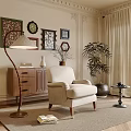 Elegant Single Sofa in Living Room with Framed Artworks Floor Lamp Side Cabinet and Rug