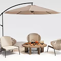 Woven Outdoor Chairs With Round Table And Patio Umbrella For Relaxing Patio Area