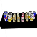 Refreshing Assorted Beverage Cans and Bottles on Tray with Ice Cubes
