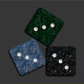 Colorful Household Dice With Green Blue Black Bodies And White Dots