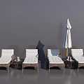 Outdoor Wicker Lounge Chairs With White Cushions Side Tables And Umbrella