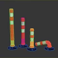 Orange and White Striped Traffic Bollards with Upright and Curved Shapes and Black Bases