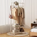 Stylish Clothing Rack with Hanging Clothes Bags and Storage Baskets in Bedroom