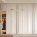 Modern Walk in Closet Interior Design With White Cabinets Golden Handles And Open Compartments