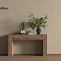 Modern Wooden Console Table with Green Plant Picture Frame and Decorative Items in Natural Home Entryway