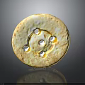 Round Yellowish Object With Multiple Holes And Rough Surface On Gray Background