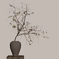 Twig With Leaves In Ceramic Vase On Wooden Stand Against Orange Sunset Background