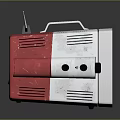 Red And Silver Electronic Appliance With Antenna Control Knobs And Ventilation Holes